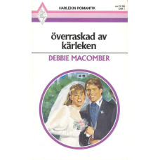 Harlekin romantik DM1
Överraskad av kärleken