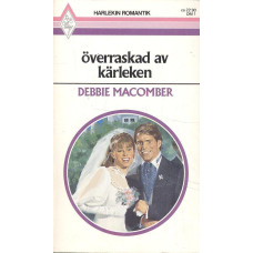 Harlekin romantik DM1
Överraskad av kärleken